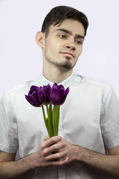 Guy with tulips - Foto, Imagem
