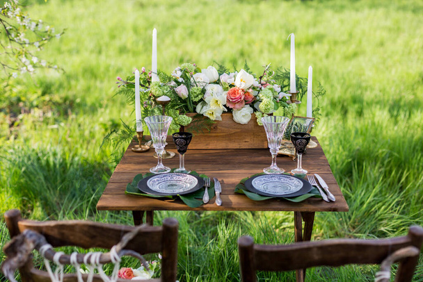 Wedding decor. Table for the newlyweds outdoor.  Wedding reception. - Photo, Image