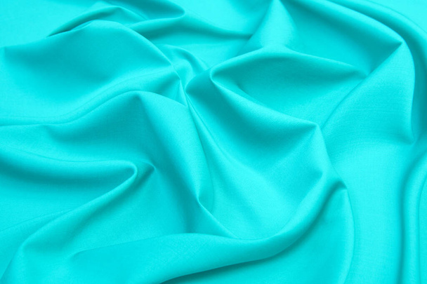 Dark ocean green matte background of fabric cloth, closeup, pattern. - Photo, Image