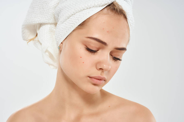 woman with towel on head. High quality photo - Foto, Imagem
