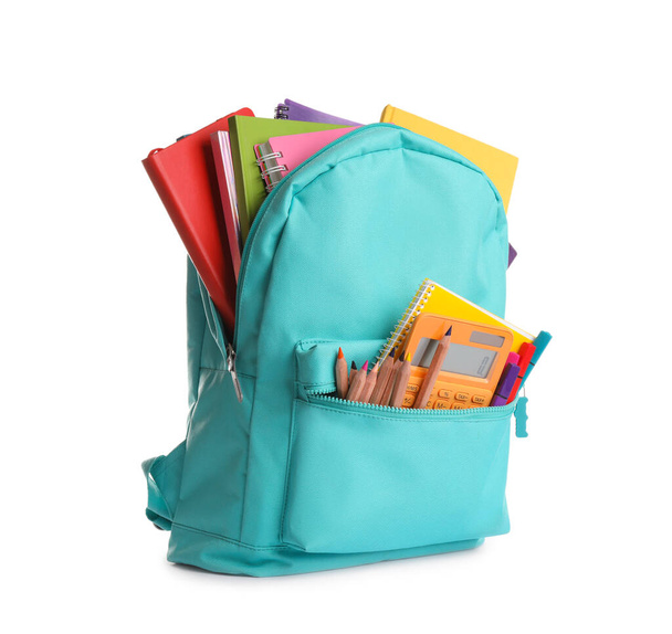 Turquoise backpack with different school supplies isolated on white - Valokuva, kuva