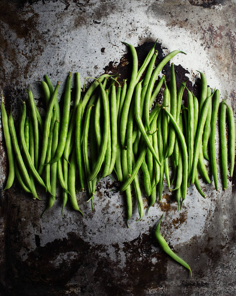 Fresh harvest of vegetables and herbs. Farm production of vegan food. String beans on a dark background. Green Organic Food - Foto, Bild