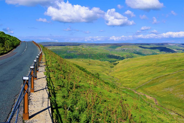 The Buttertubs Pass is a high road  in the Yorkshire Dales, with magnificent views on either side.  It runs from Simonstone to Muker and has a series of unique geographical features. - Photo, Image