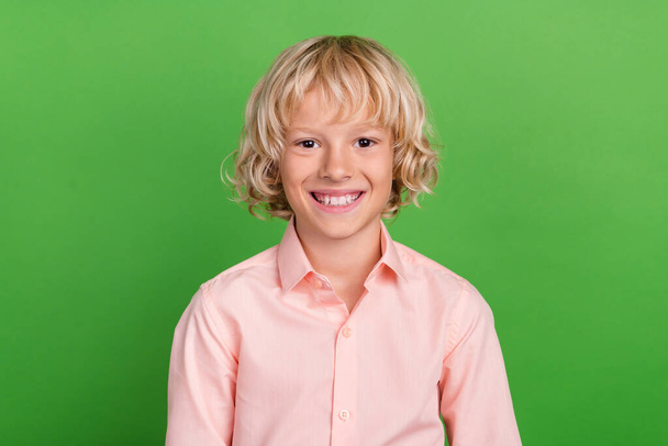 Photo of young cheerful happy positive boy good mood smile wear shirt formalwear isolated on green color background - Foto, Bild