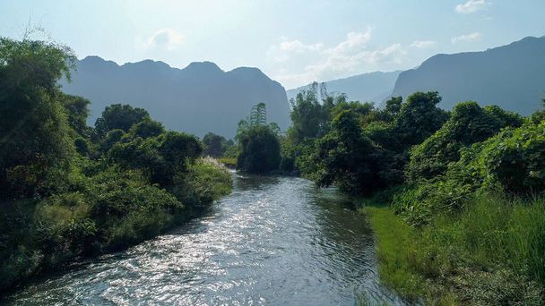 River near town of Vang Vieng in Laos seen from the sky - Photo, Image
