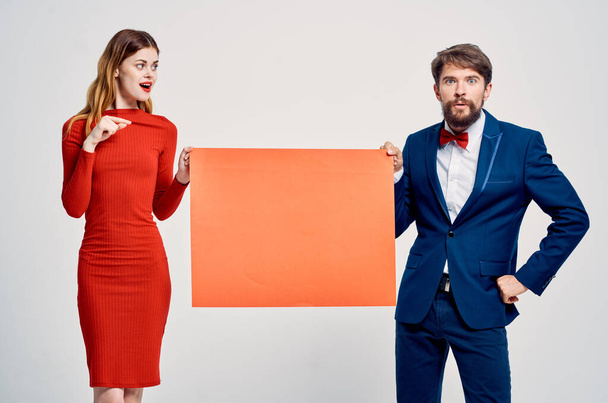 nemzeti férfi és nő tartja a gúnyolódás plakát reklám - Fotó, kép
