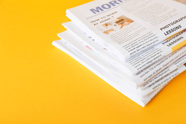 Stack of newspapers on color background - Photo, Image