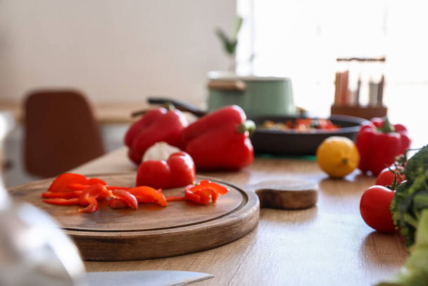 Fresh vegetables on table in kitchen, closeup - Valokuva, kuva