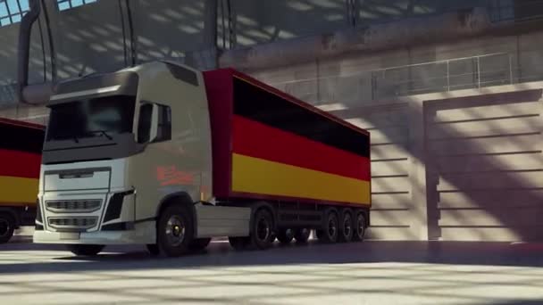 Φορτηγά με γερμανική σημαία. Φορτηγά από τη Γερμανία που φορτώνουν ή εκφορτώνουν στην αποβάθρα αποθήκης - Πλάνα, βίντεο