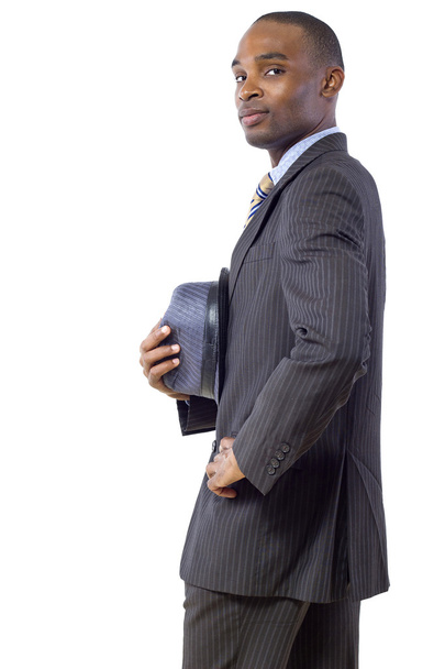 Black businessman taking hat off - Foto, imagen