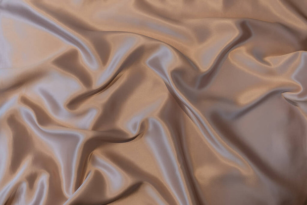 Текстура шелковых тканей шелковых шелковых шелковых тканей розового цвета для фона  - Фото, изображение