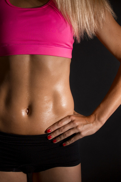 Sweaty female abdominal muscles - Valokuva, kuva