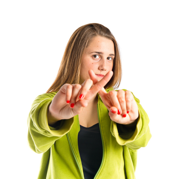 Girl doing NO gesture over white background  - Photo, Image