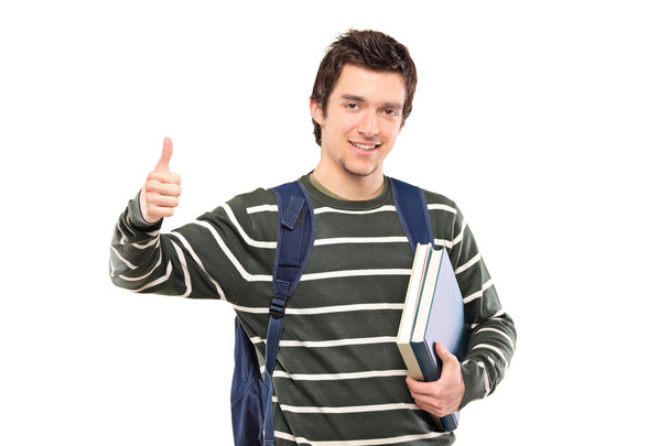 Male student giving thumb up - 写真・画像