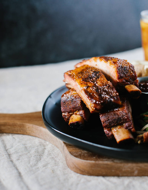 A closeup shot of delicious barbecue pork ribs - Photo, image