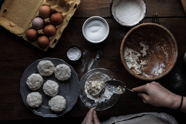 A top view of the process of making delicious pastry out of dough - 写真・画像