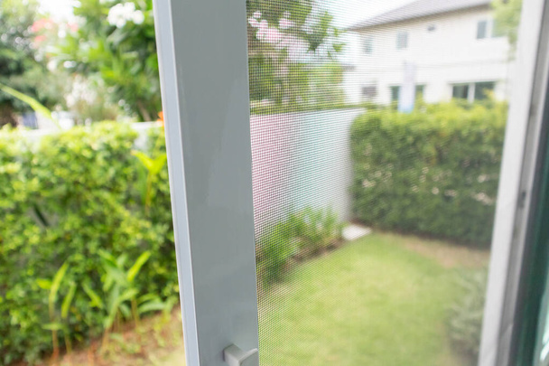 mosquito net wire screen on house window protection against insect - Photo, Image
