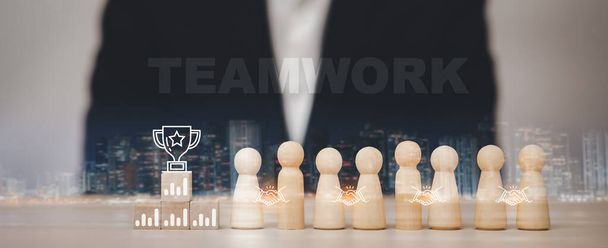 Teamwork and thinking, creative concept,  Wooden Human resources office looking for a leader and CEO concept with  word '' TEAMWORK'' on the wood cubes on the table, Champions podium mockup,  - Photo, Image