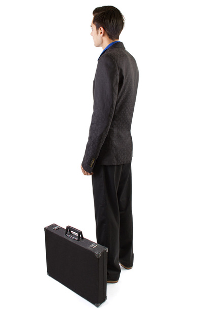 Businessman travelling with luggage - 写真・画像