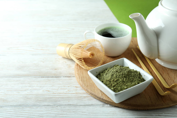 Concept of japanese tea with matcha on white wooden table - Photo, Image