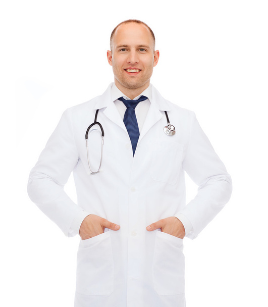 smiling male doctor with stethoscope - Фото, изображение