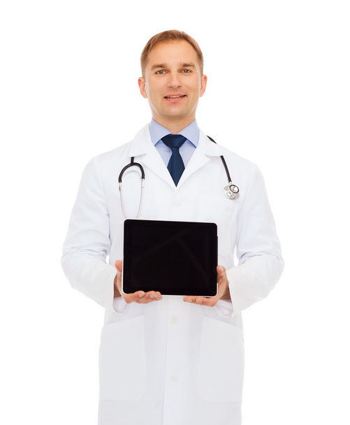 smiling male doctor with tablet pc - Foto, immagini