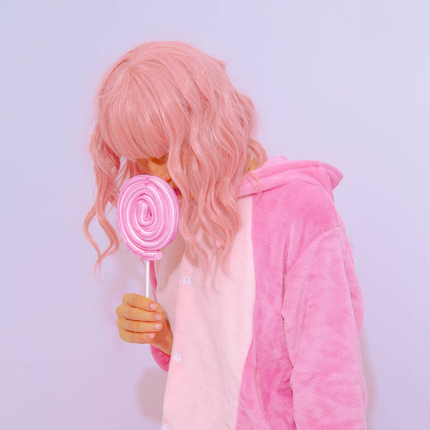 Pink Pajamas Party Girl.  Lollipop candy lover. Minimal. Home Relax style. Kigurumi shop - Valokuva, kuva