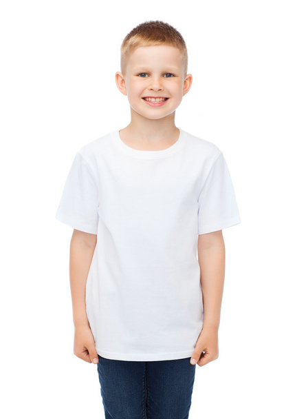 smiling little boy in white blank t-shirt - Фото, изображение