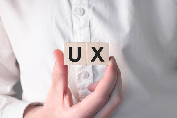 ux. Acronym of questions and answers or job of tester or quality engineer. - Foto, Imagem