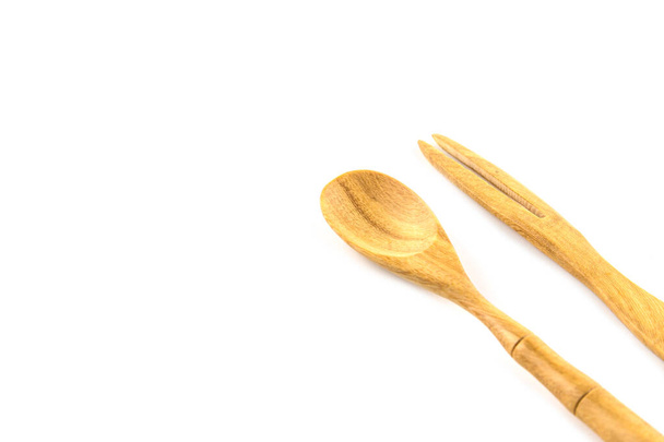 Mini cucchiaio e forchetta in legno isolati su sfondo bianco - Foto, immagini