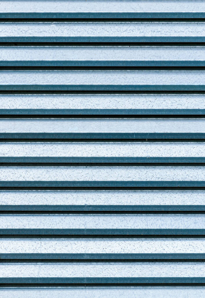 A vertical shot of metallic blinds texture background - Photo, image