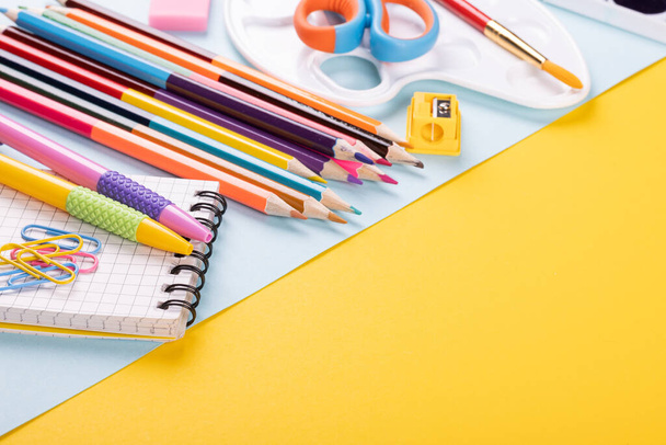School supplies on a color background. - Fotó, kép