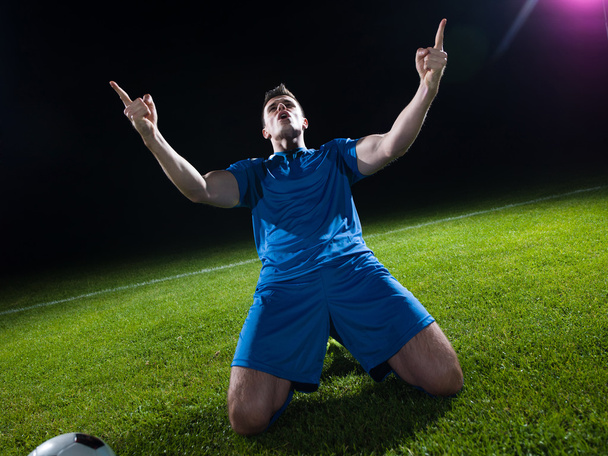 Football player is celebrating success - Fotó, kép