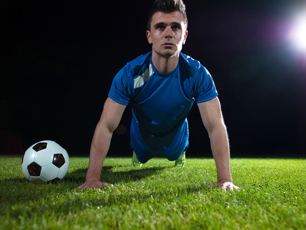 Soccer player and ball - Foto, Bild