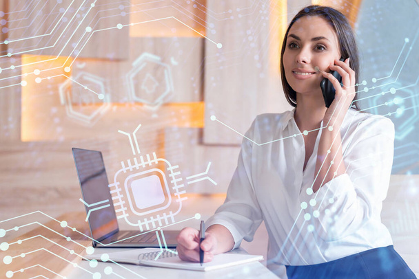 Attractive businesswoman in white shirt has conference call to optimize development by implying new technologies in business process. Hi tech hologram over office background - Φωτογραφία, εικόνα
