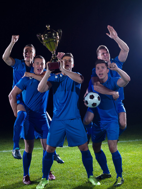 Soccer players celebrating victory - Fotoğraf, Görsel