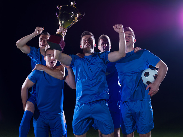 Soccer players celebrating victory - Valokuva, kuva
