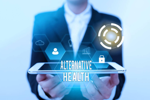 Text sign showing Alternative Health. Business overview products and practices that are not part of standard care Lady In Uniform Holding Touchpad Showing Futuristic Virtual Interface. - Foto, Imagen