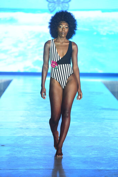 MIAMI BEACH, FLORIDA - JULY 08: A model walks the runway for Olga Niknoza Show during Miami Swim Week The Shows powered by DCSW on July 08, 2021 in Miami Beach, Florida - Zdjęcie, obraz