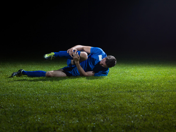 Soccer player in pain - Zdjęcie, obraz