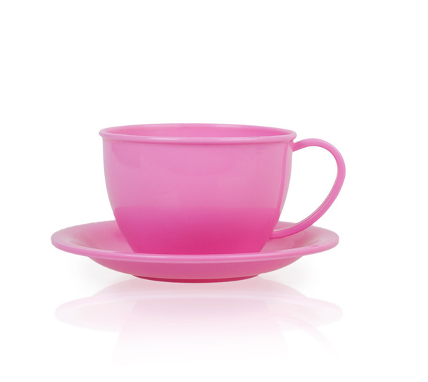 rózsaszín műanyag játék csésze és csészealj - Fotó, kép