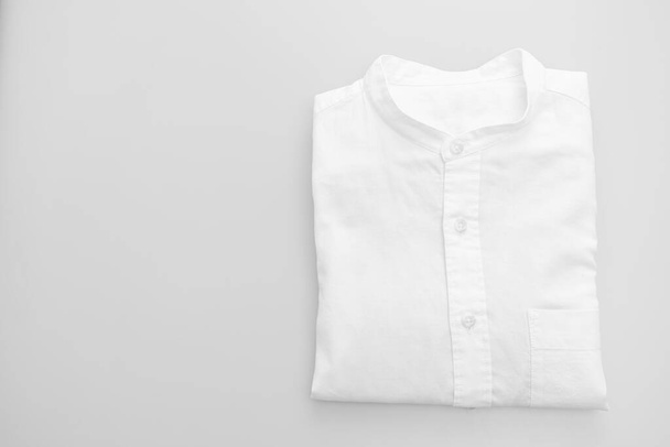 white shirt fold on white background - Foto, Imagem
