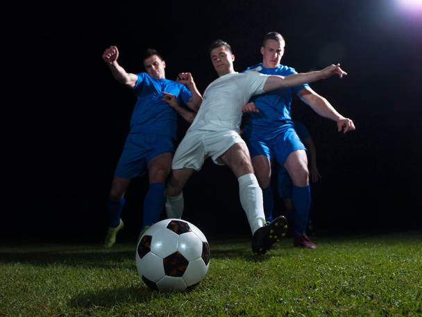 Soccer players duel - Foto, Bild