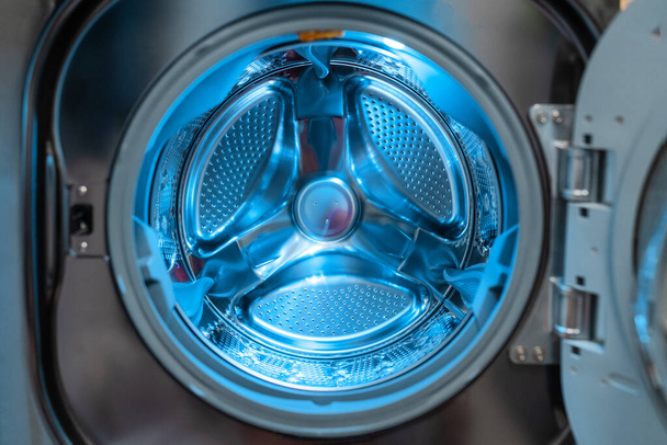 Washing machine laundry home appliance closeup of inside drum - 写真・画像