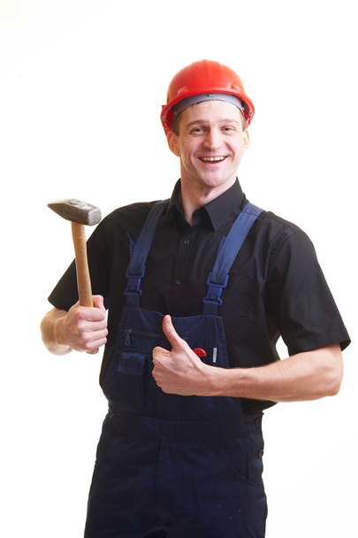 A munkavállaló a piros kemény kalap elszigetelt fehér portréja - Fotó, kép