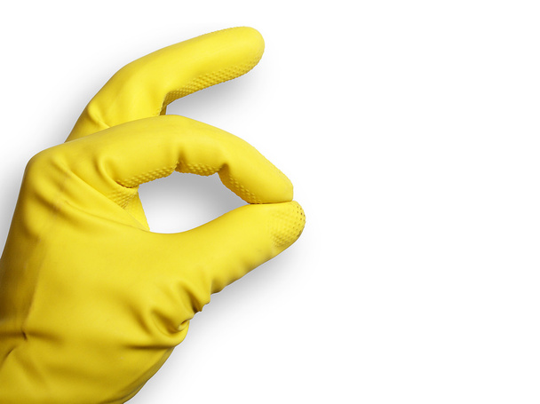 The image shows a human hand with a rubber glove over white - Photo, Image