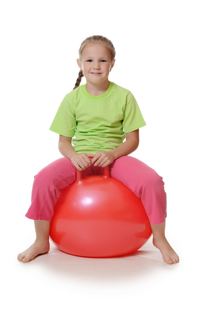 Little girl on a gymnastic ball - Фото, зображення