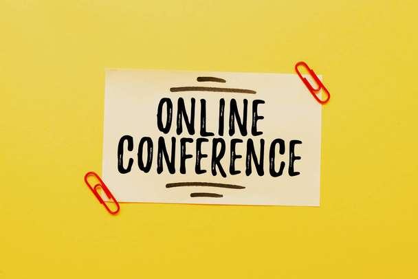 Sign displaying Online Conference. Business overview online service by which you can hold live meetings Critical Thinking Finding Clues Answering Questions Collecting Data - Photo, Image