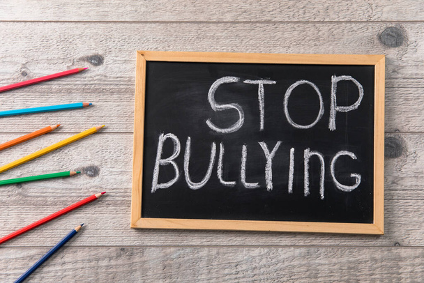 Chalkboard with text STOP BULLYING and pencil - Foto, immagini
