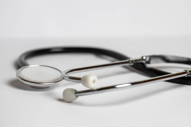 Medical stethoscope on a white background. Medical equipment. Medical healthcare. - Fotografie, Obrázek
